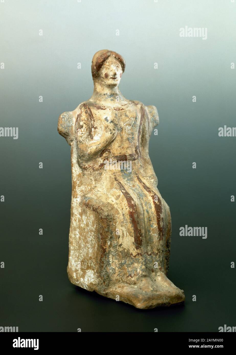 Iberian era. Female sculpture in terracotta depicting a goddess of fertility. National Archaeological Museum. Madrid, Spain. Stock Photo