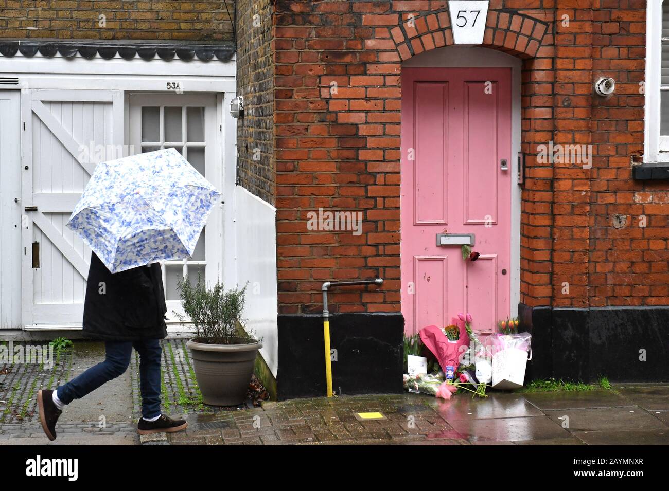 Floral tributes placed outside Caroline Flack's former home in North London. Stock Photo