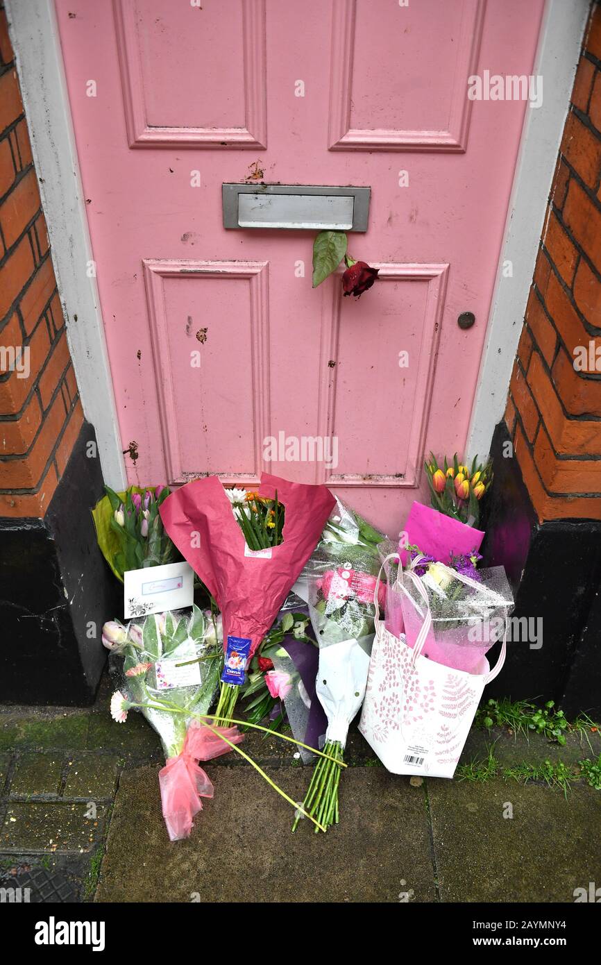 Floral tributes placed outside Caroline Flack's former home in North London. Stock Photo