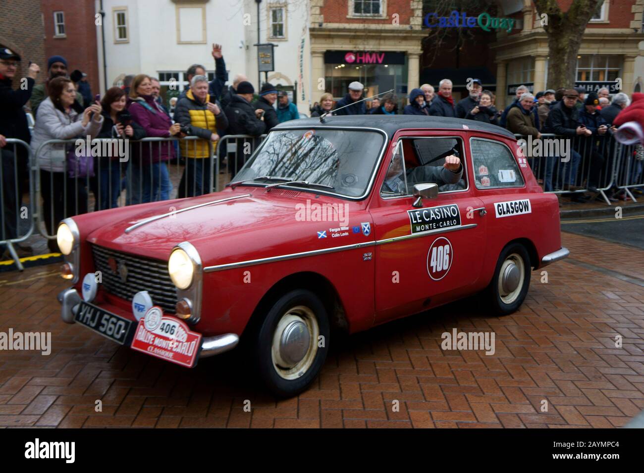 Car Number 406 leaving Passage Control in Banbury at the Rallye Monte-Carlo Historique Stock Photo