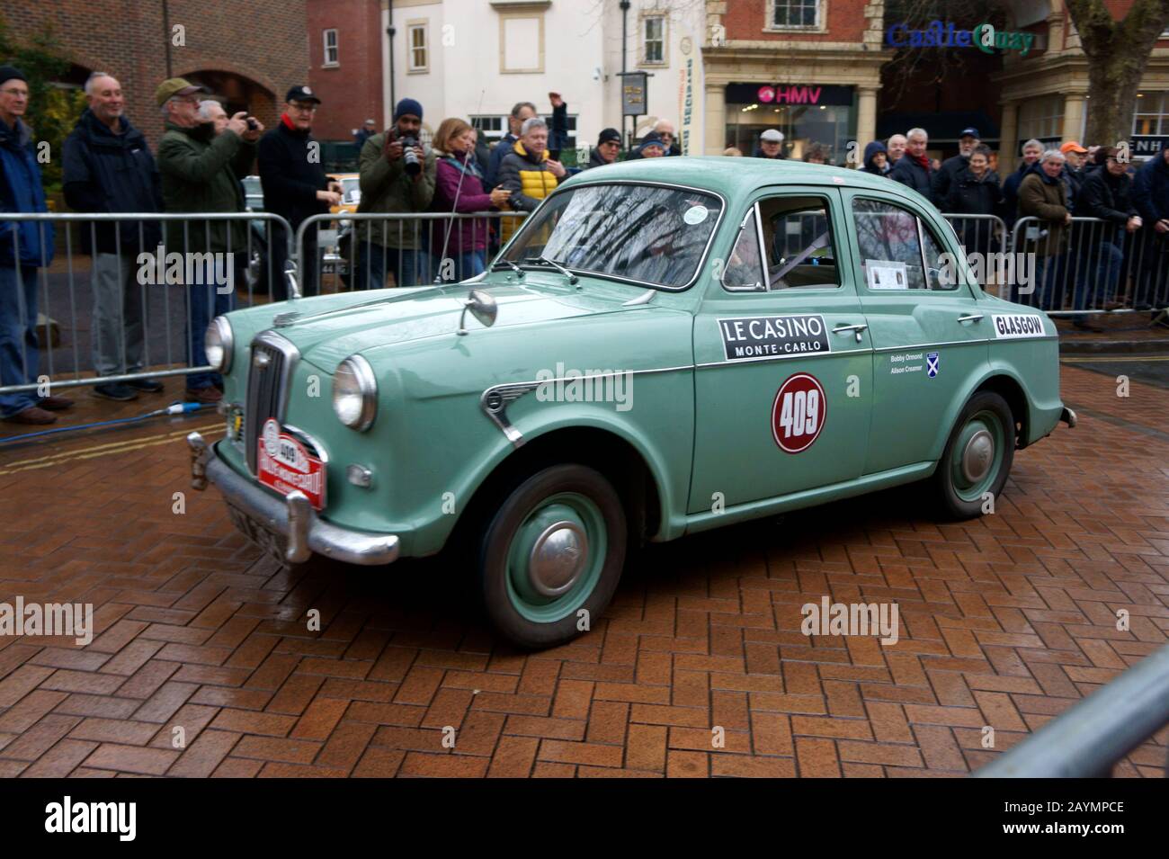 Car Number 409 leaving Passage Control in Banbury of the Rallye Monte-Carlo Historique Stock Photo