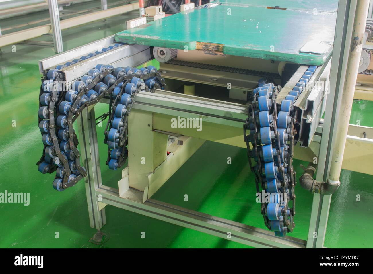 Conveyor chain drive shaft production line of the factory. soft focus Stock Photo