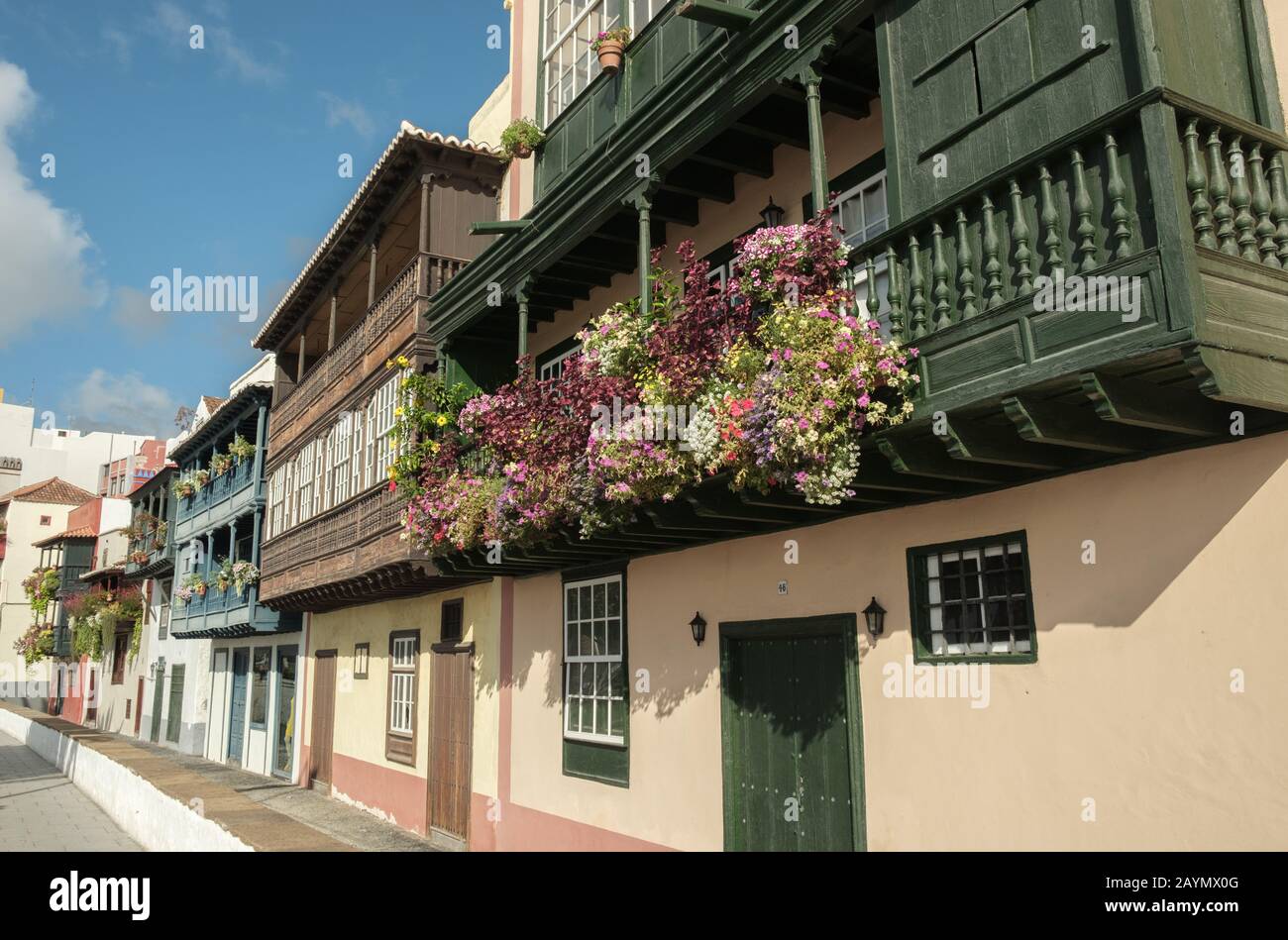 Traditional pretty spanish houses with hanging flowers and balconies, Santa Cruz de La Palma, on the island of La Palma, Canary Islands, Spain Stock Photo