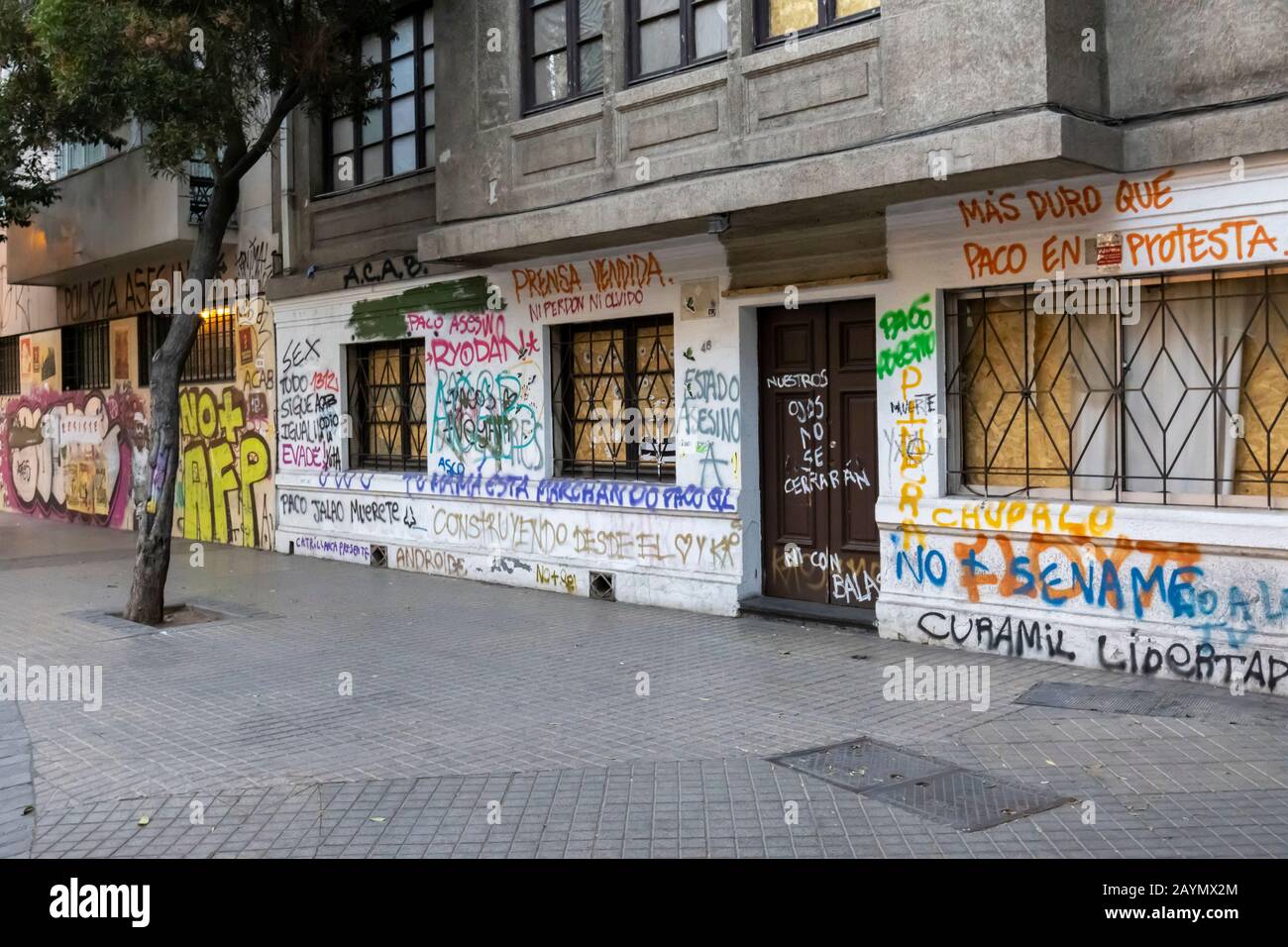 Graffiti from the political unrest and protests on a wall in Lastarria, Central Santiago, Metropolitan Region, capital city of Chile, South America Stock Photo