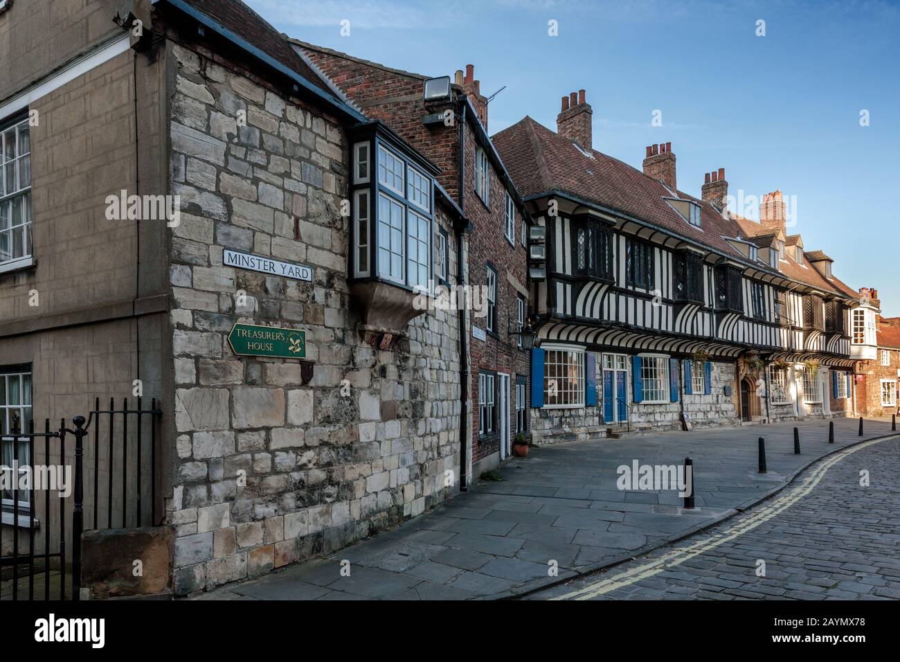 Corner of Minster Yard and College Street with timber framed building of  St William's College,York, England, Uk Stock Photo