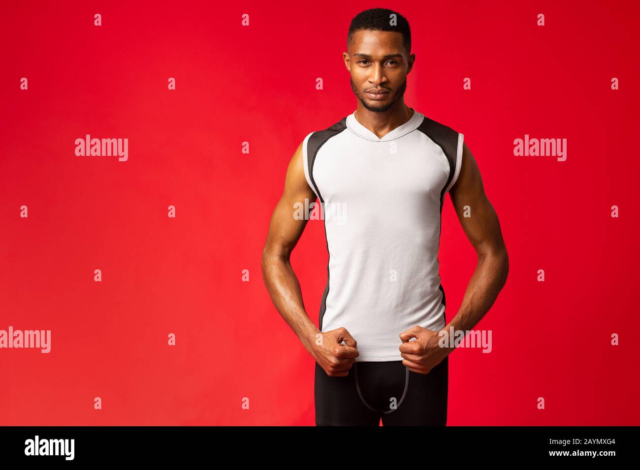 Afro sportsman standing in stance at studio Stock Photo