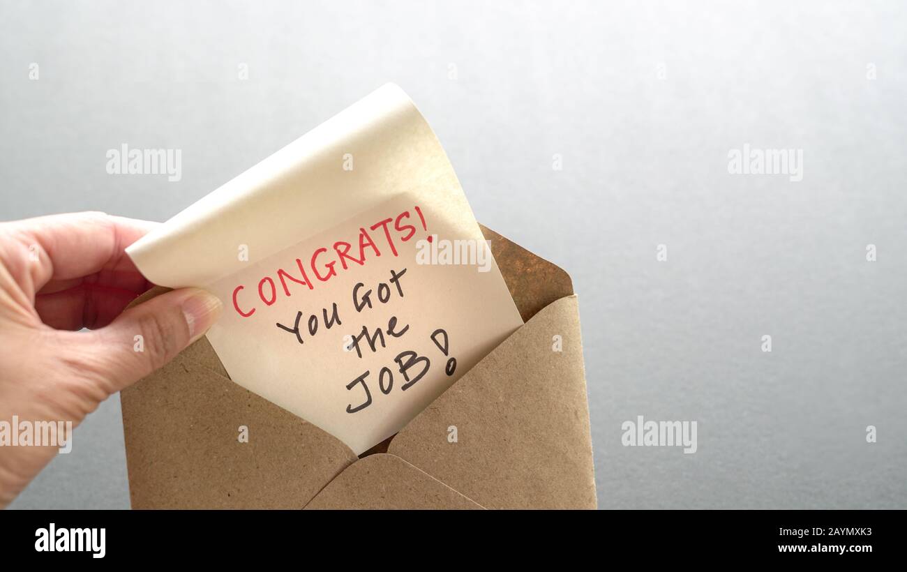 Congrats you got the job, a message inside a brown envelope. New job or