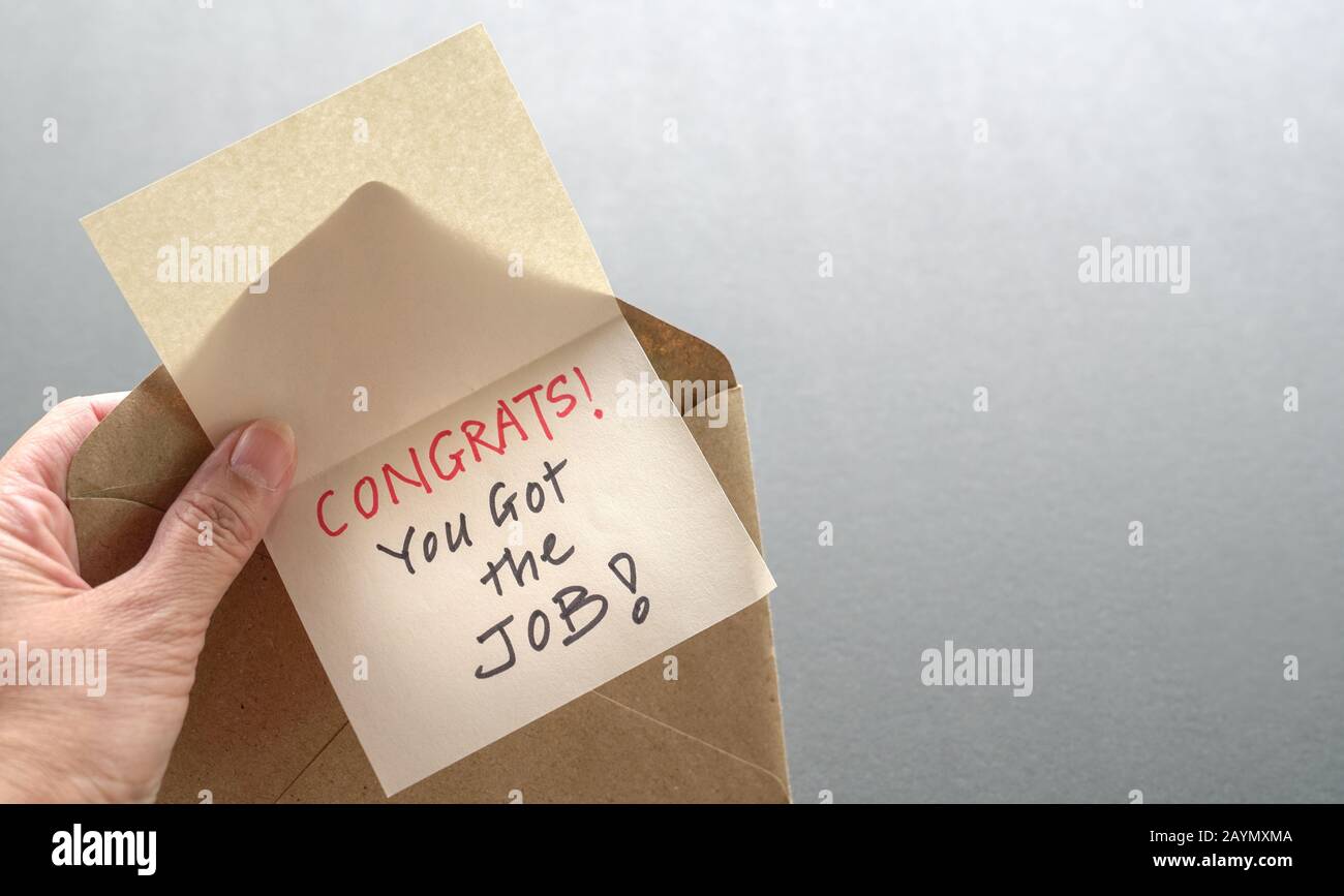 Congrats you got the job, a message inside a brown envelope. New job or