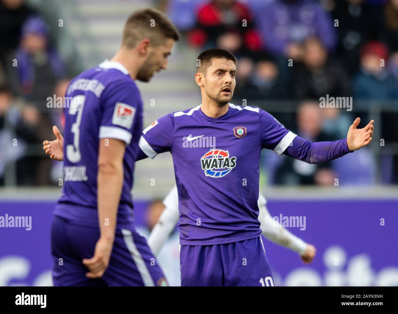 Aue, Germany. 16th Feb, 2020. Football: 2nd Bundesliga, FC Erzgebirge Aue - Holstein Kiel, 22nd matchday, at the Sparkassen-Erzgebirgsstadion. Aues Dimitrij Nazarov (r) spreads his arms next to Marko Mihojevic. Credit: Robert Michael/dpa-Zentralbild/dpa - IMPORTANT NOTE: In accordance with the regulations of the DFL Deutsche Fußball Liga and the DFB Deutscher Fußball-Bund, it is prohibited to exploit or have exploited in the stadium and/or from the game taken photographs in the form of sequence images and/or video-like photo series./dpa/Alamy Live News Stock Photo