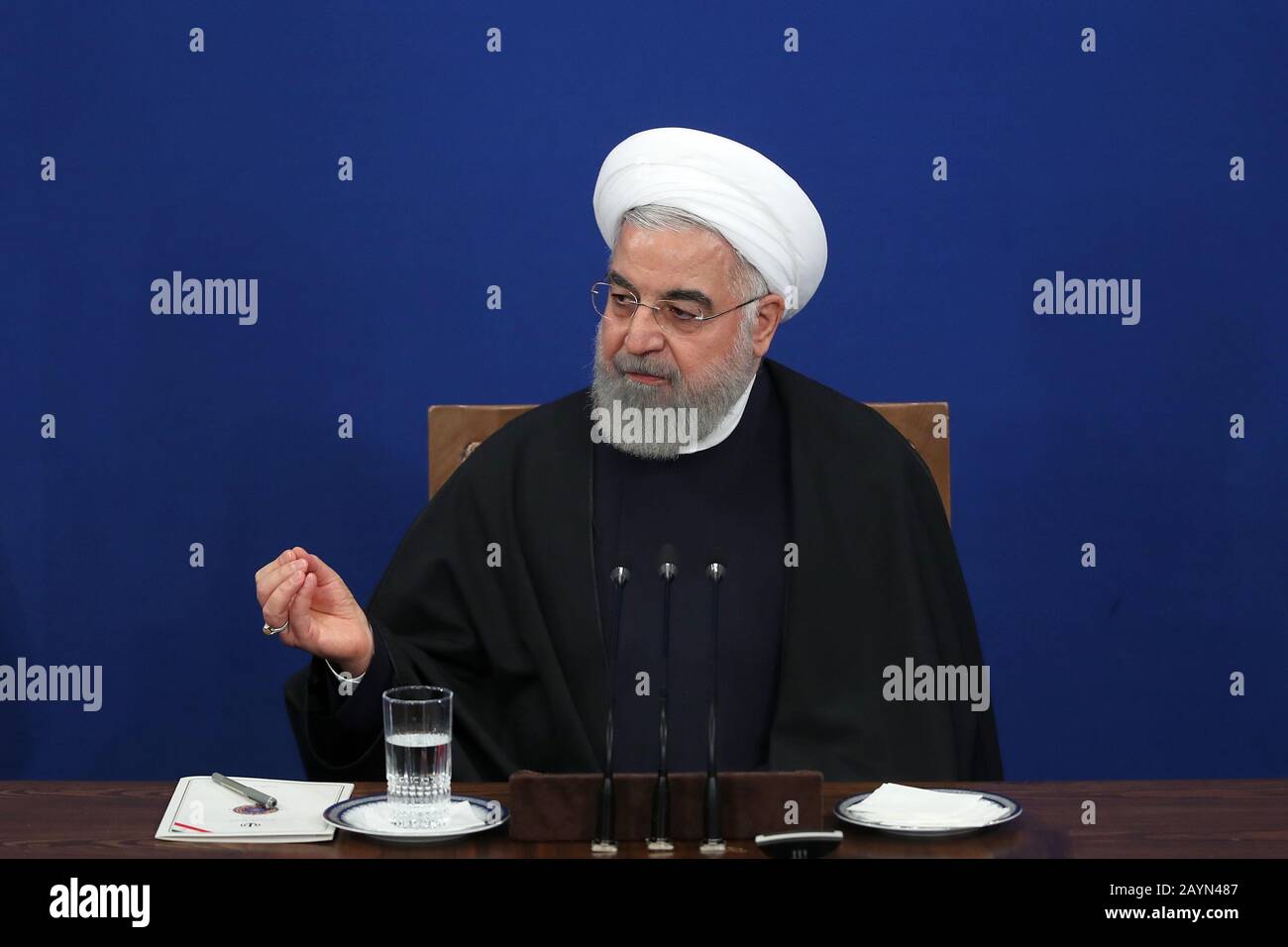 Tehran, Iran. 16th Feb, 2020. A handout picture provided by the Iranian presidency on February 16, 2020, shows Iranian President HASSAN ROUHANI speaks during a news conference in the capital Tehran. Rouhani appeared in a press conference with domestic and international media outlets and spoke about the most important domestic issues, as well as the positions of the Islamic Republic of Iran regarding regional and international issues. Rouhani said: Tehran will not negotiate with the United States under pressure, Washington must first lift the sanctions and reinstate its commitment to the Joi Stock Photo
