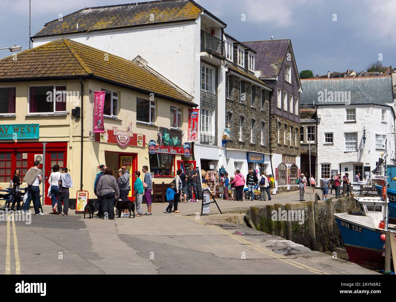 Mevagissey, Cornwall, Tourists shopping in a coastal town Stock Photo
