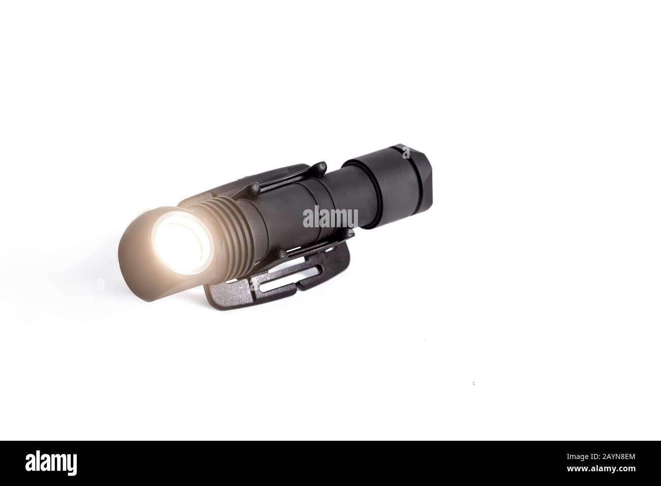 Head lamp flashlight with light beam studio shot Stock Photo