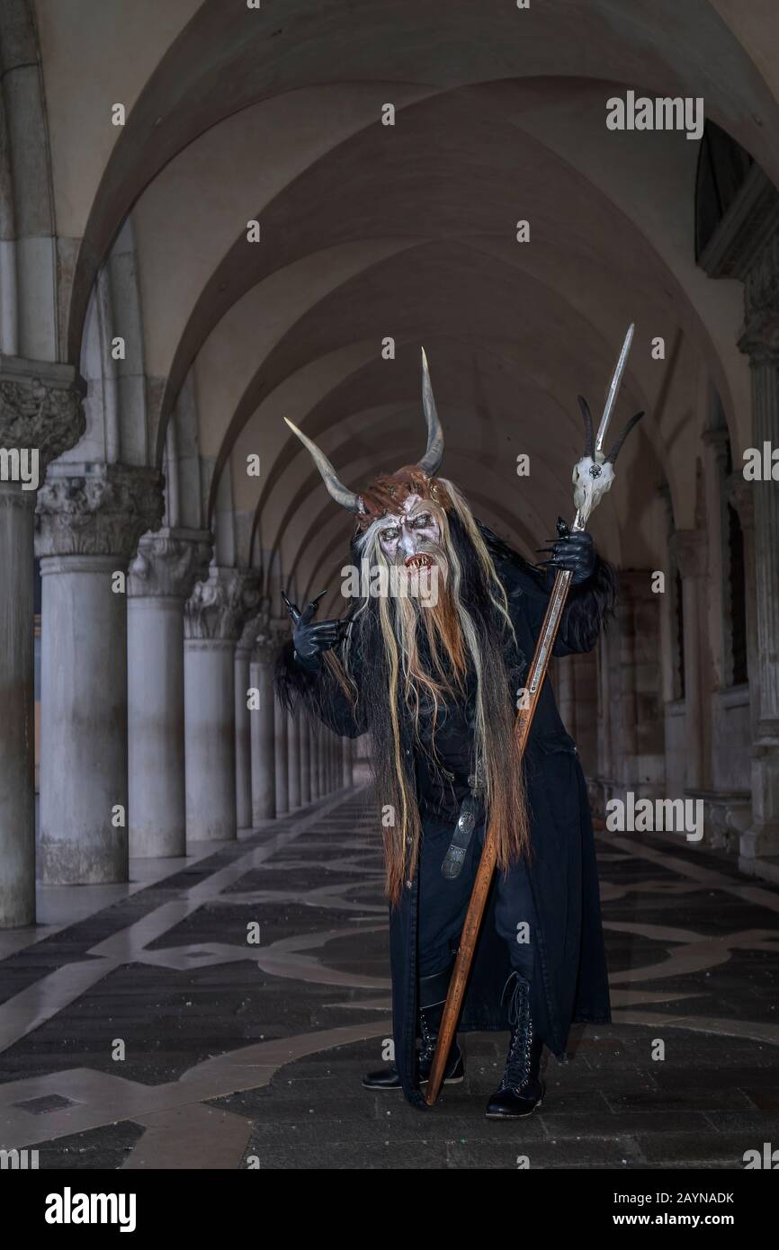 People In  Fantastic Costumes At The Venice Carnival In Italy Stock Photo