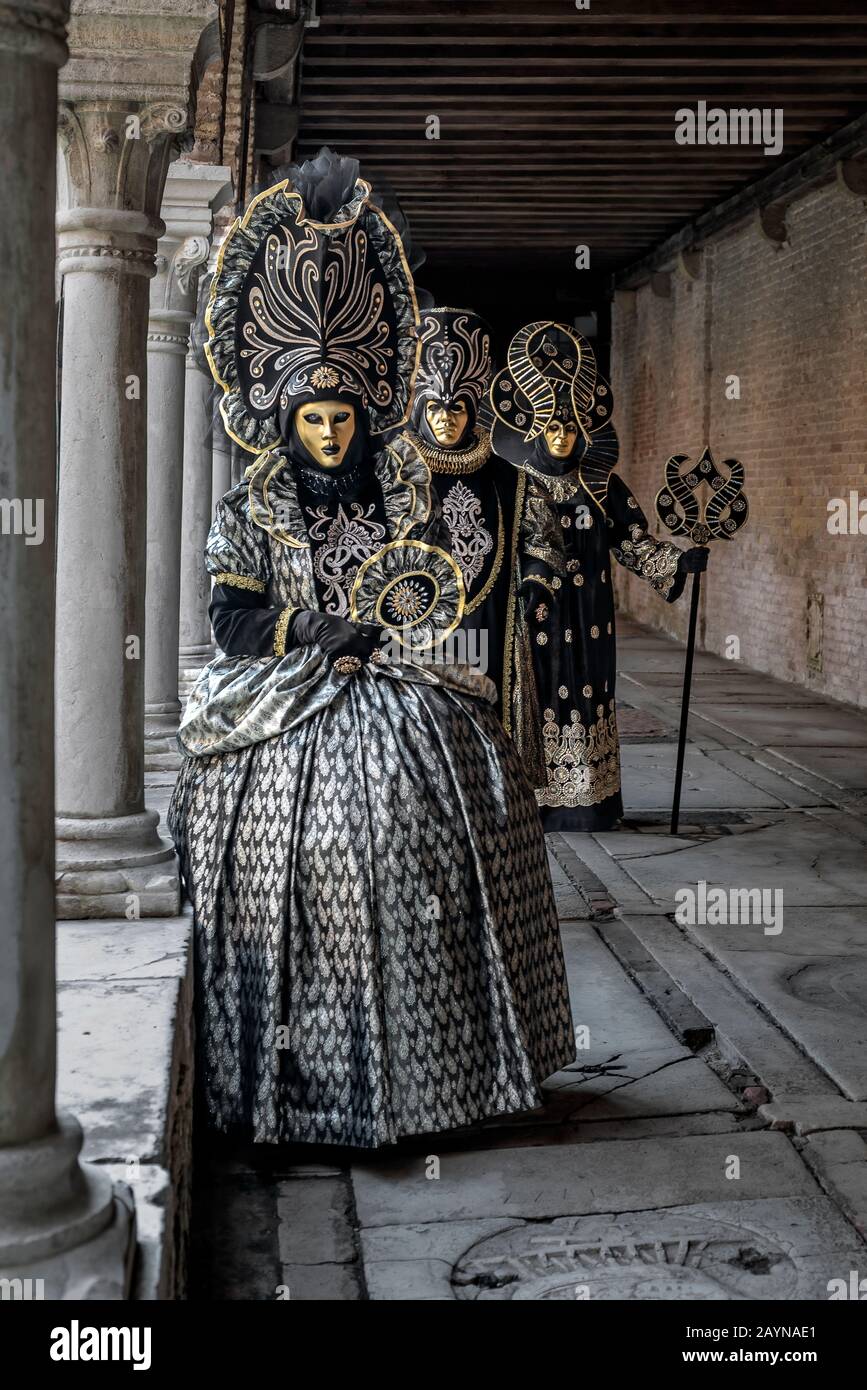 People In  Fantastic Costumes At The Venice Carnival In Italy Stock Photo