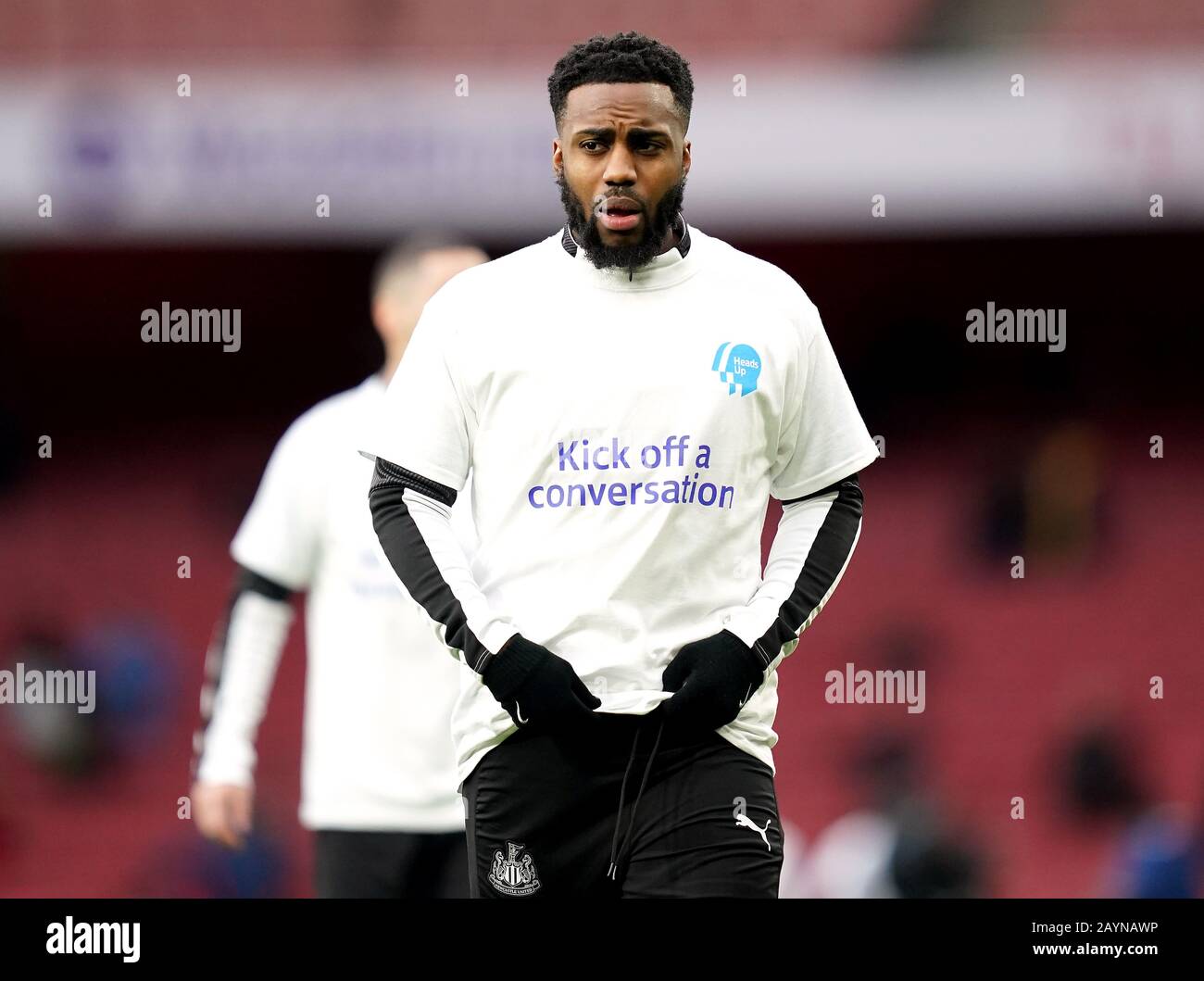 Newcastle United's Danny Rose warms up before the Premier League match at The Emirates Stadium, London. Stock Photo