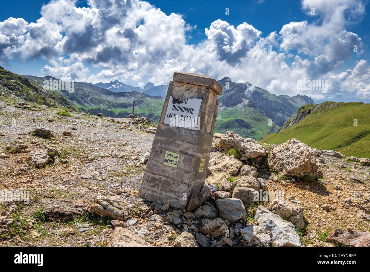 A landscape photo of the peak marker on top of Col du Bonhomme on the Tour du Mont Blanc trek in the French Alps Stock Photo