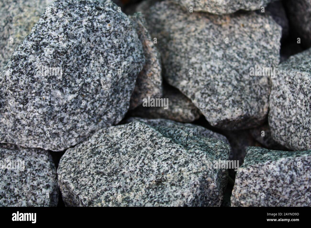 The picture shows a background with many grey stones Stock Photo Alamy