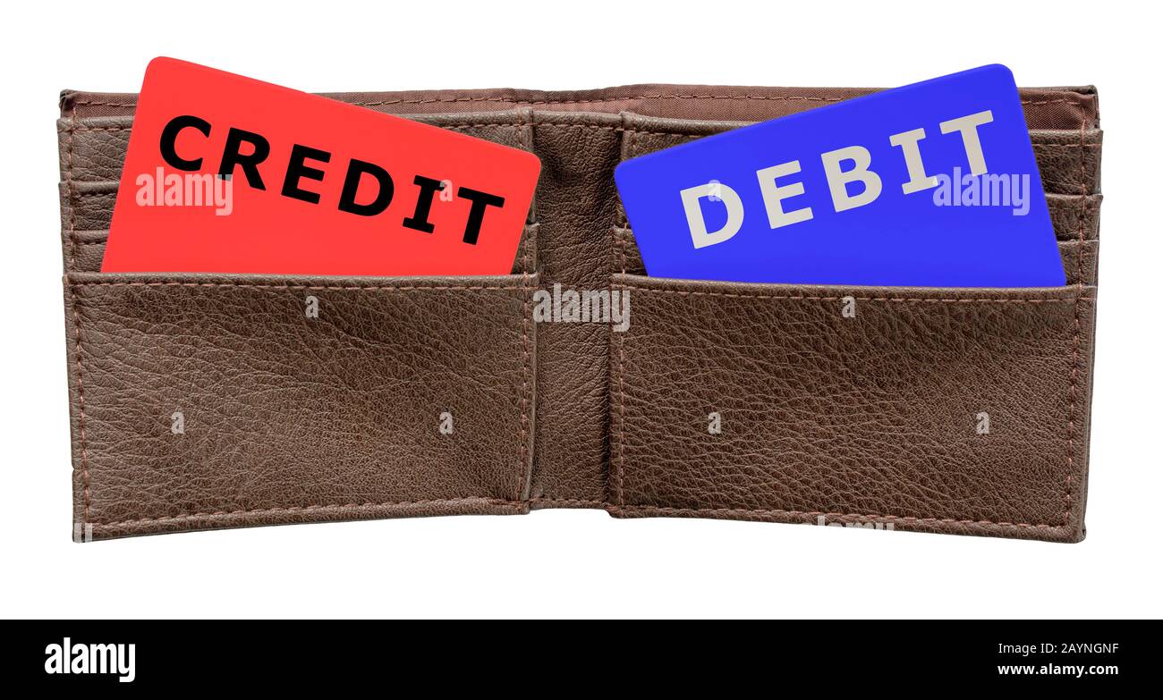 Credit and debit cards in a brown leather men's wallet on an isolated white background with a clipping path Stock Photo