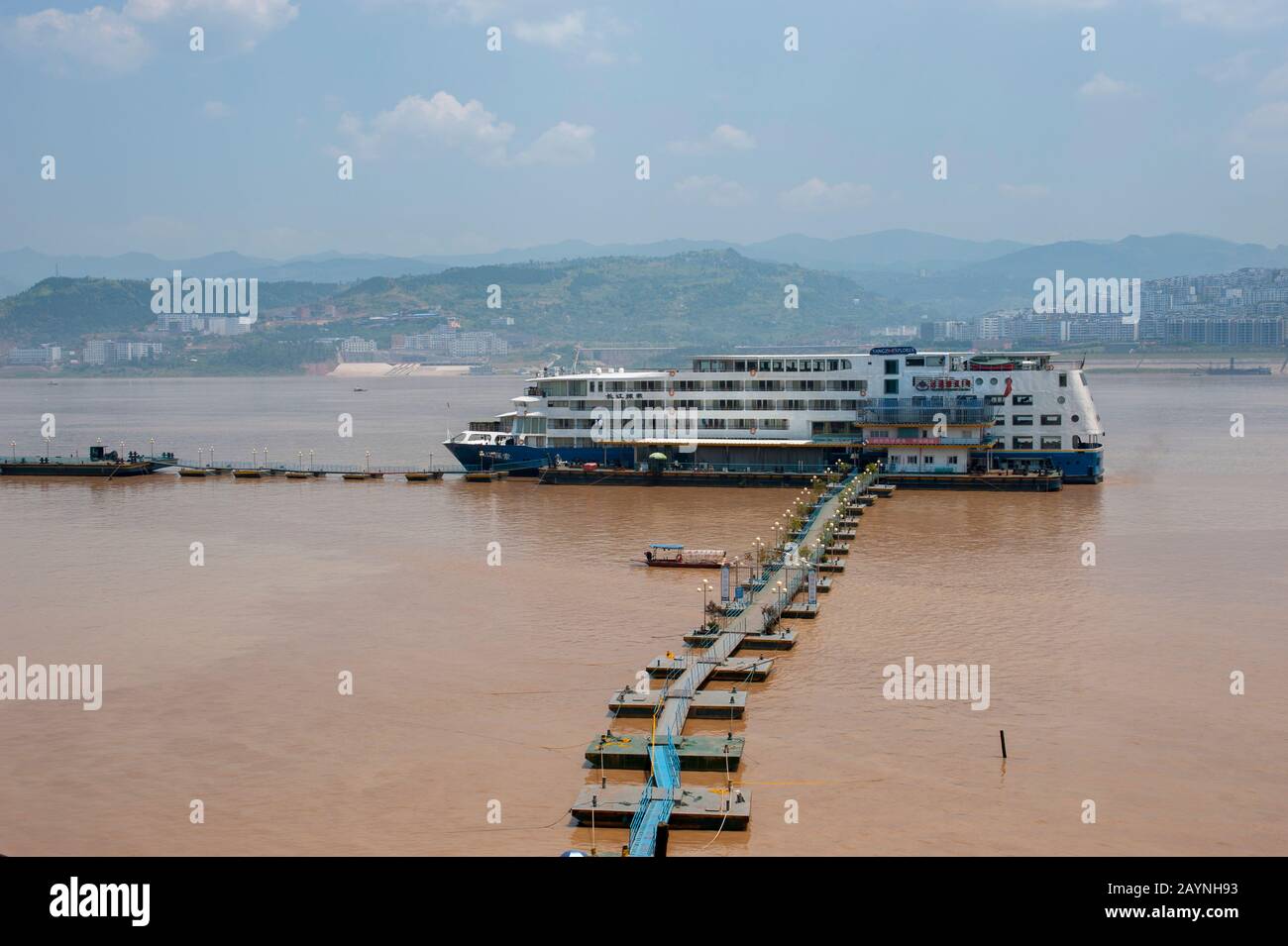 The cruise ship MS Yangzi Explorer is docked at the city of Fengdu on the Yangtze River in China. Stock Photo