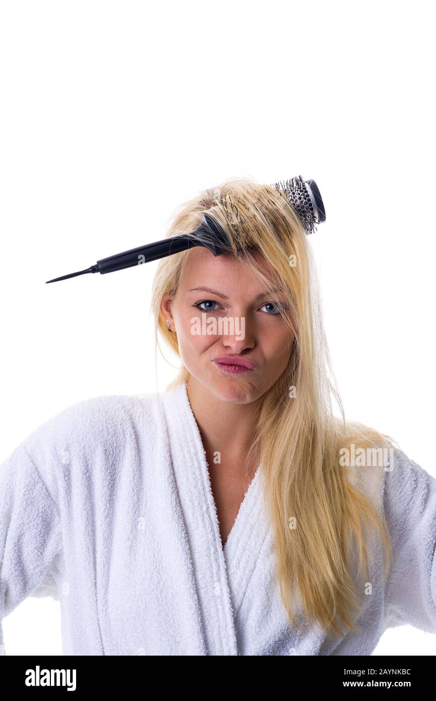 Frau mit Haarbürste Stock Photo