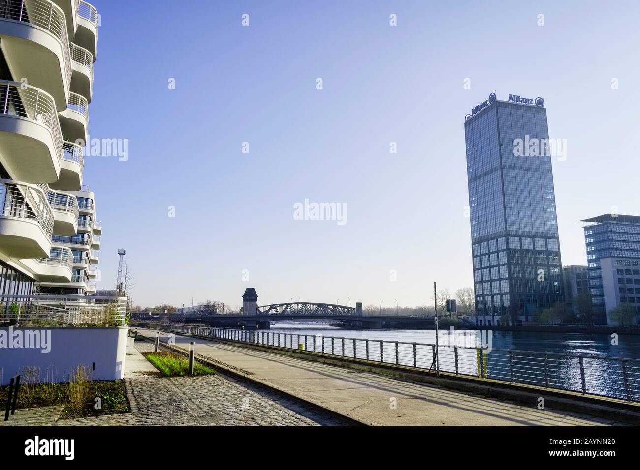 Luxury apartment building WAVE, Elsenbrücke bridge and Treptowers at River Spree, Berlin, Germany Stock Photo