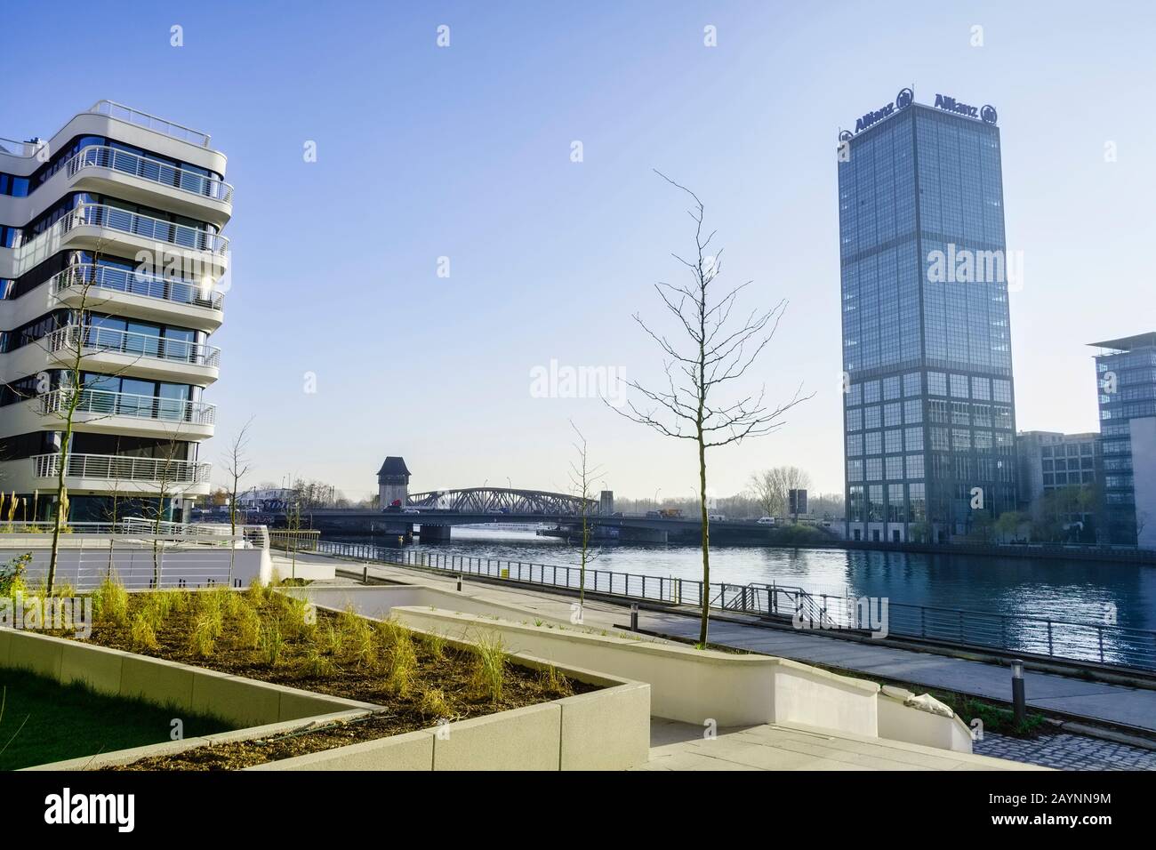 Luxury apartment building WAVE, Elsenbrücke bridge and Treptowers at River Spree, Berlin, Germany Stock Photo