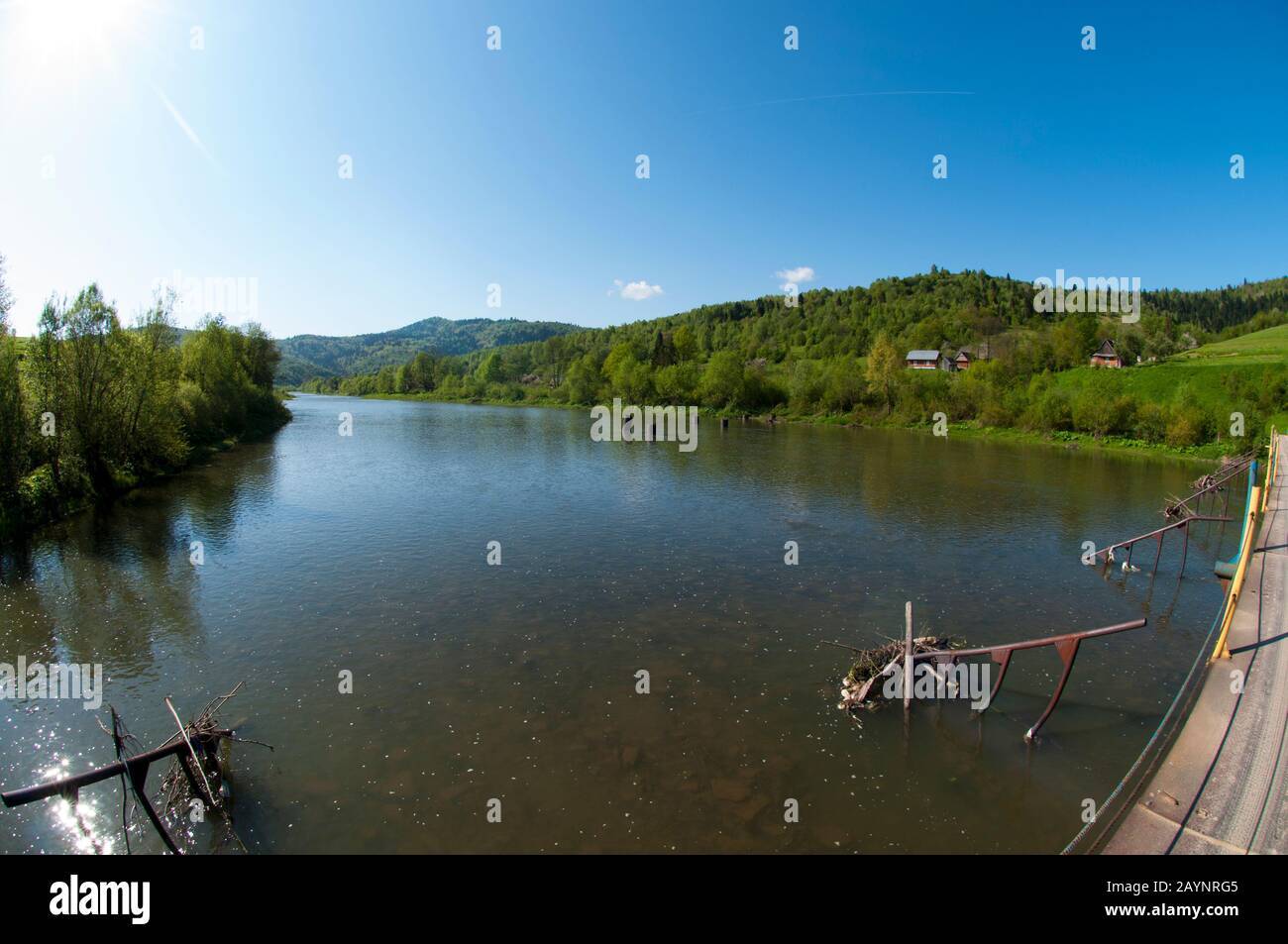 beautiful river in the summer mountains in the open air with a clean blue sky Stock Photo