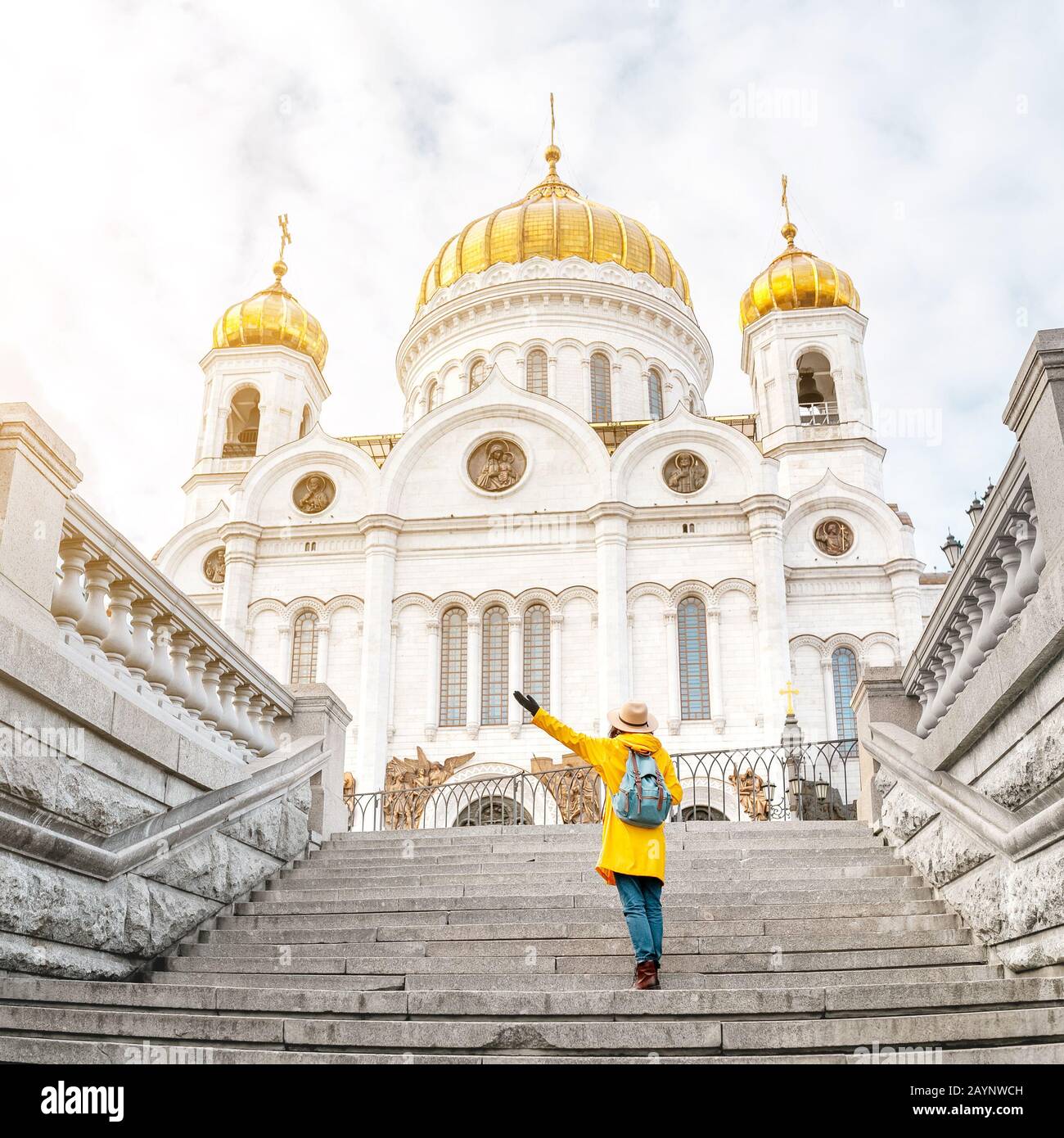 Happy asian tourist woman at the Cathedral of Christ the Savior. Travel and tourism in Russia and Moscow concept. Religion and faith Stock Photo