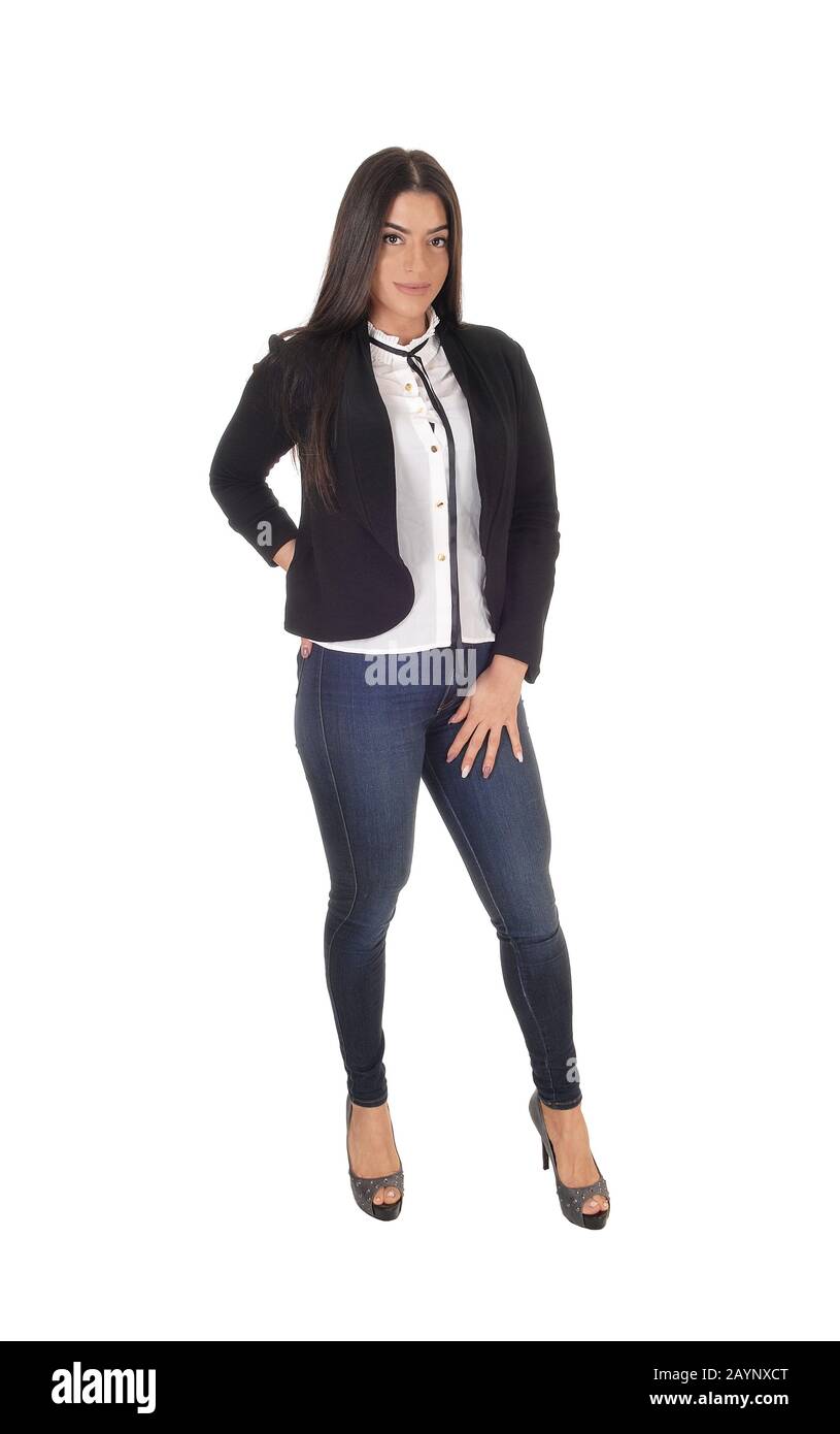 A gorgeous young woman standing in jeans and a black jacket as business outfit, isolated for white background Stock Photo