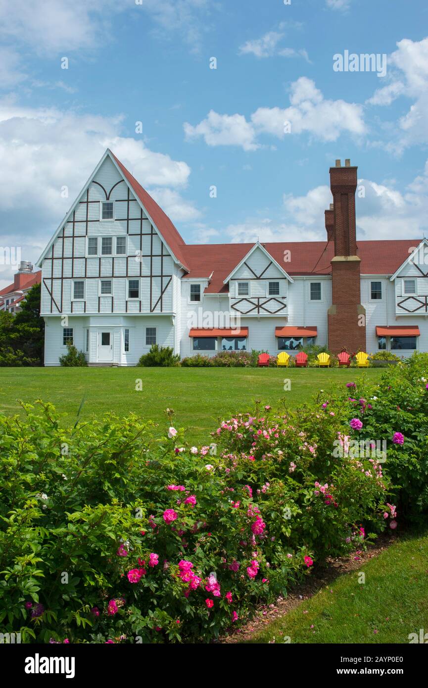 Colorful Adirondack Chairs in front of the Keltic Lodge Resort and Spa, which is located along the Cabot Trail on Cape Breton Island, Nova Scotia, Can Stock Photo