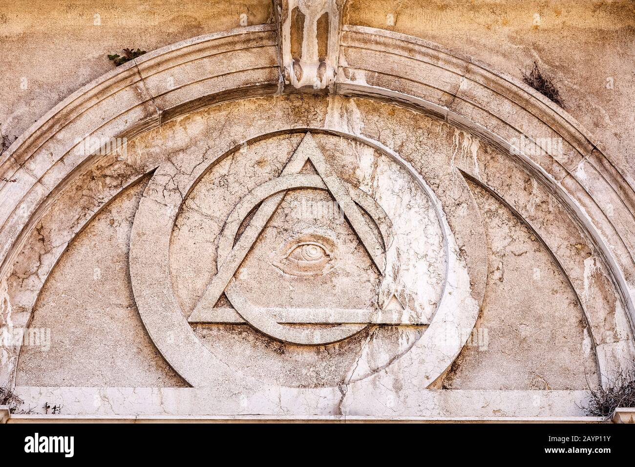 Conspiracy theory concept of Illuminati triangle and All Seeing Eye on an ancient temple Stock Photo