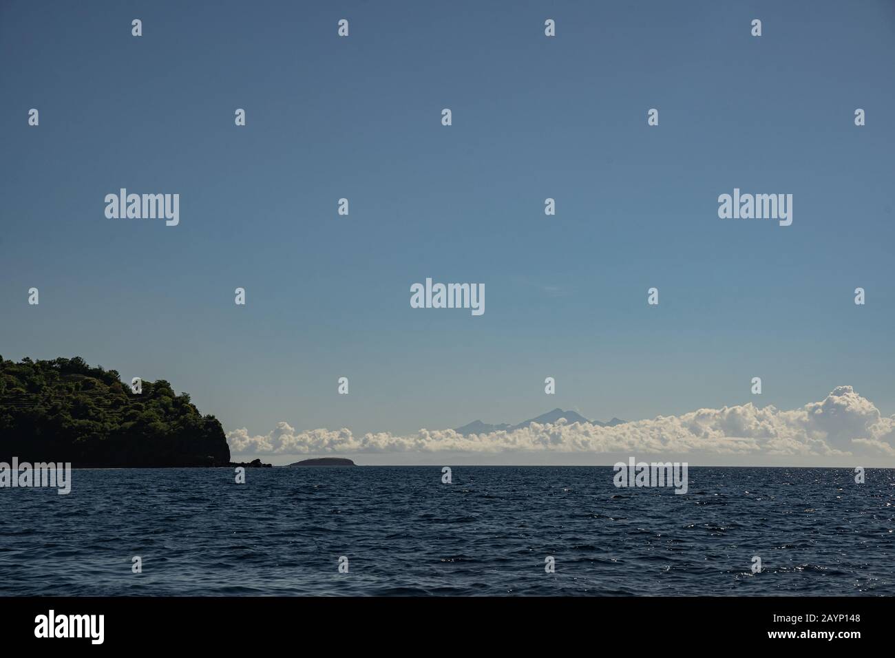 Calm sea and blue sky on background Stock Photo - Alamy