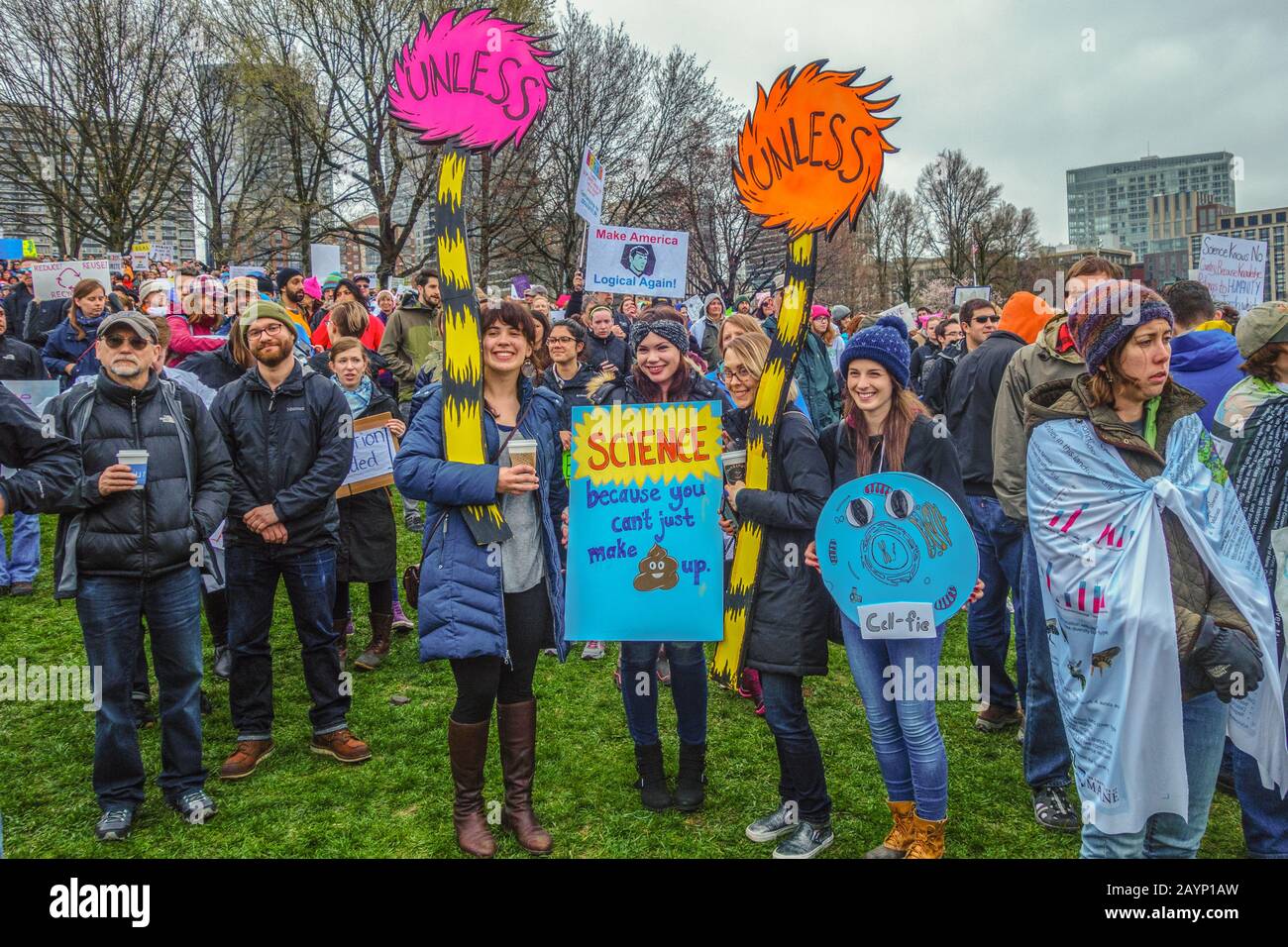 April 22, 2017/Boston, MA, USA-Young women holding protest signs during March for Science on Boston Common. Stock Photo