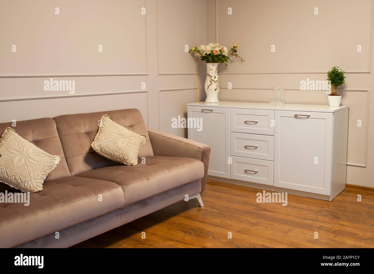 modern interior with sofa and flower vase Stock Photo