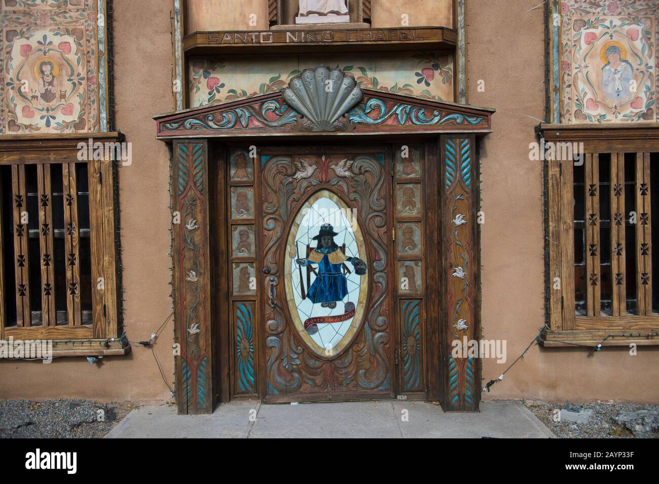 The front door of the chapel of Santo Nino de Atocha at El Santuario de Chimayo in the small community of El Potrero just outside of Chimayo, New Mexi Stock Photo