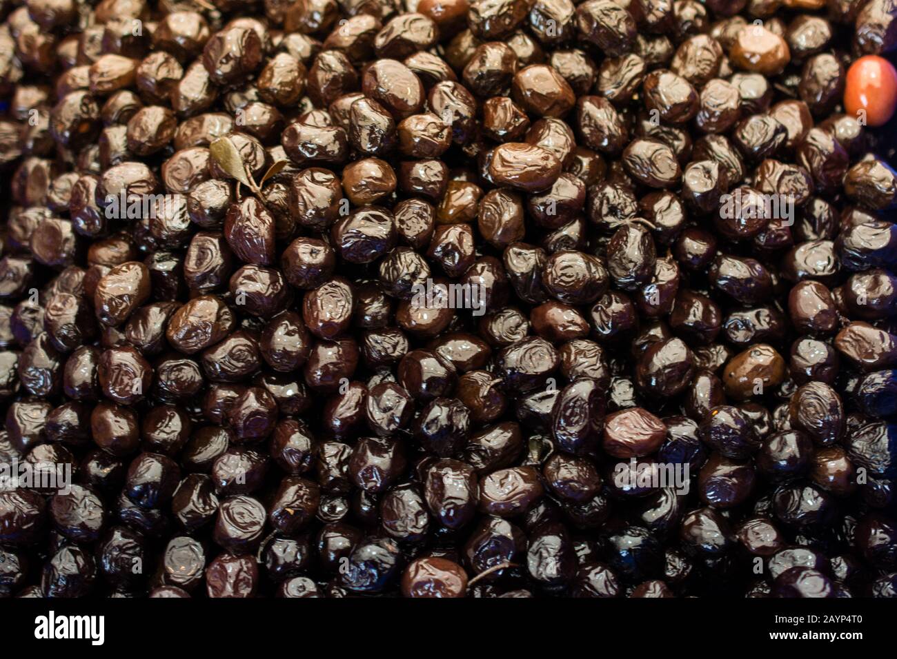 Black olives as health food preserved in olive oil Stock Photo Alamy