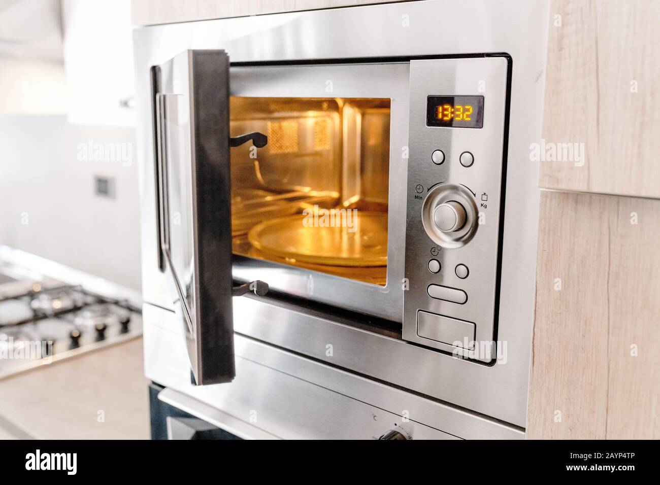 Modern hi-tek kitchen, oven with door open Stock Photo by ©starush 96536806