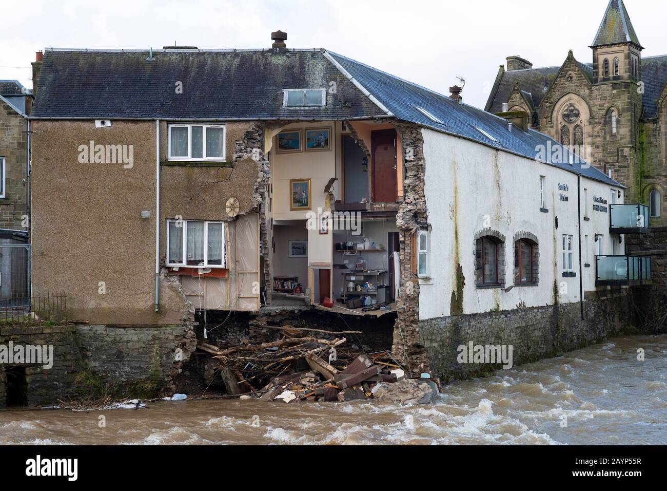 Collapsed exterior walls at Sonia's Bistro building on banks of River Teviot in Hawick, Scottish, Borders, Scotland ,UK Stock Photo