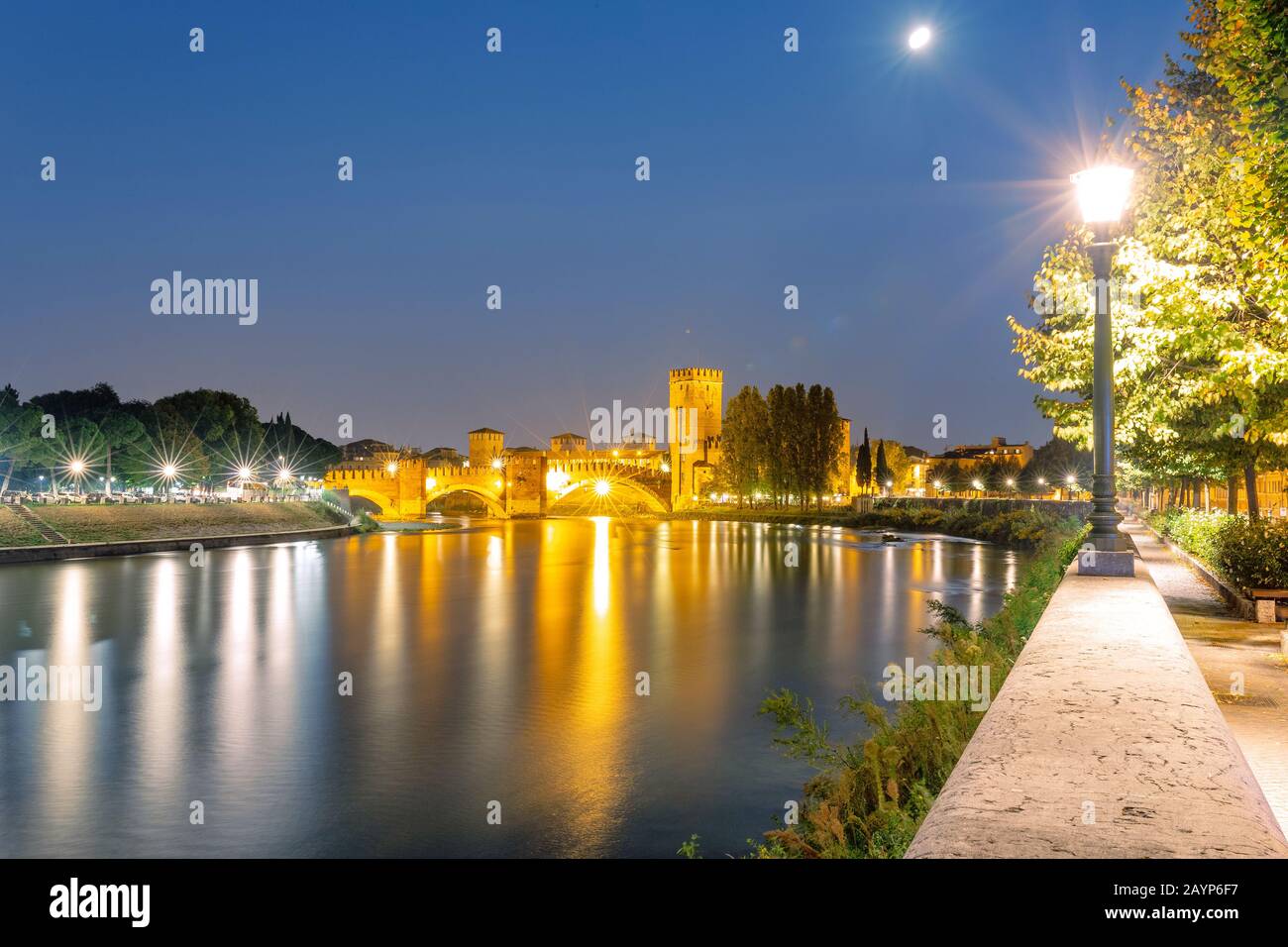 Medieval Castel Vecchio bridge over Adige river in Verona Stock Photo ...