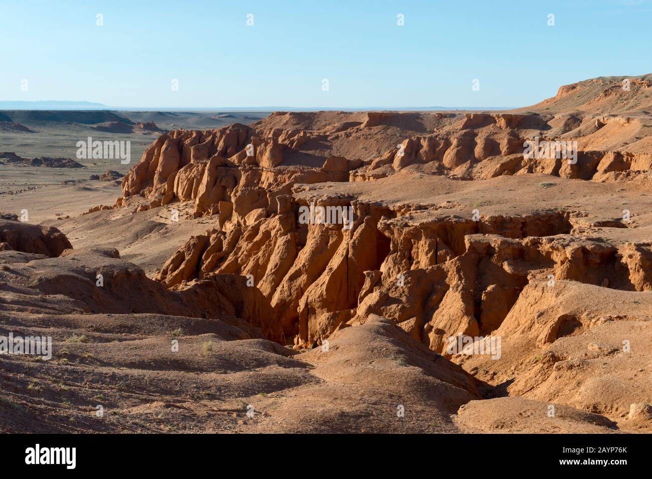 Evening sunshine on the orange rocks of Bayan Zag, commonly known as ...