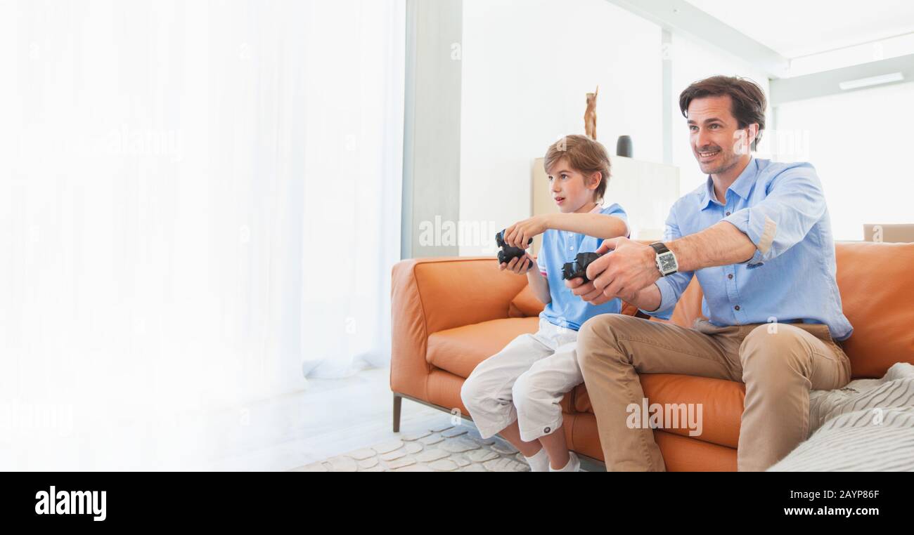 Smiling African Boy Playing Online Games in Class Stock Photo - Image of  phone, modern: 177228872