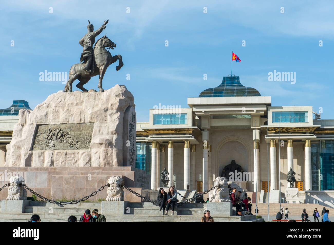 The Sukhbaatar statue on the Sukhbaatar Square or Genghis Khan Square also called Chingis Khan Square with the Government Palace in downtown Ulaanbaat Stock Photo