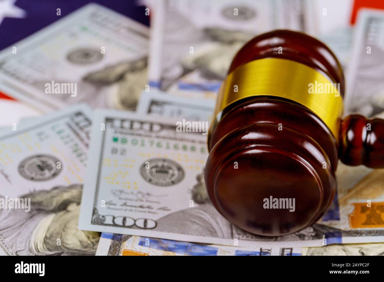 Law hammer judge and dollars on wooden table close up corruption, money financial crime Stock Photo