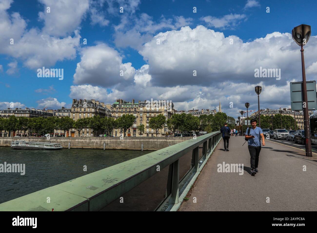 People walking on bridge in Paris, France, Europe Stock Photo