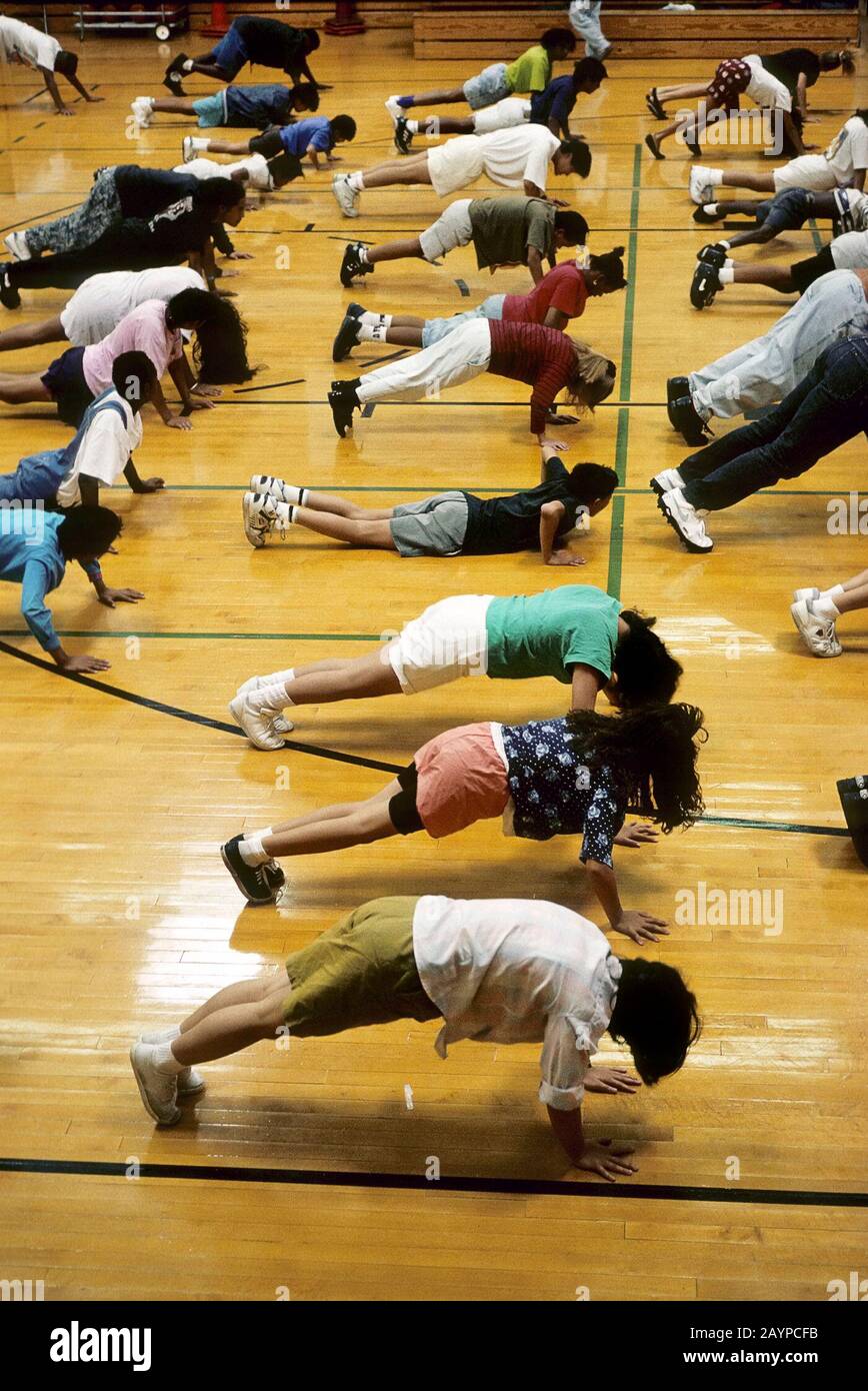 Austin Texas Middle School Students Doing Push ups During Physical