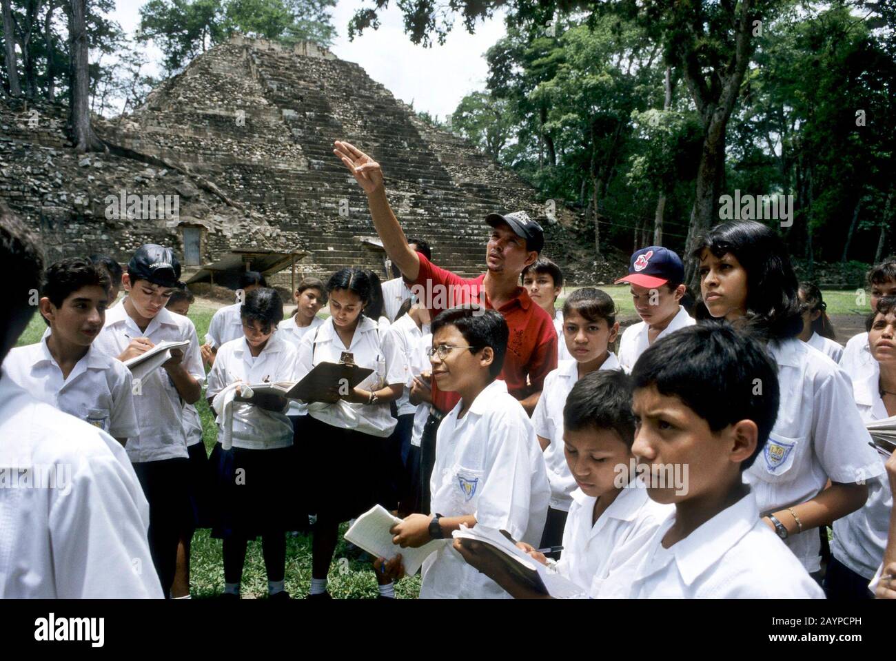 Santa Rosa de Copan, Honduras: School children takes notes during field trip to Mayan ruins near Guatemalan border  ©Bob Daemmrich Stock Photo