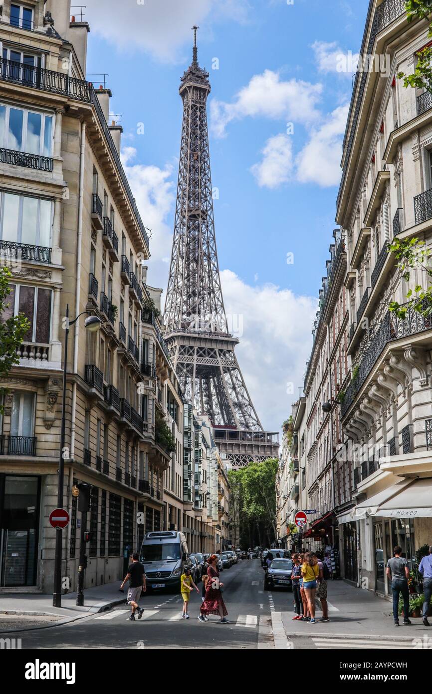 Street scene with Eiffel Tower in background Paris, France, Europe Stock Photo