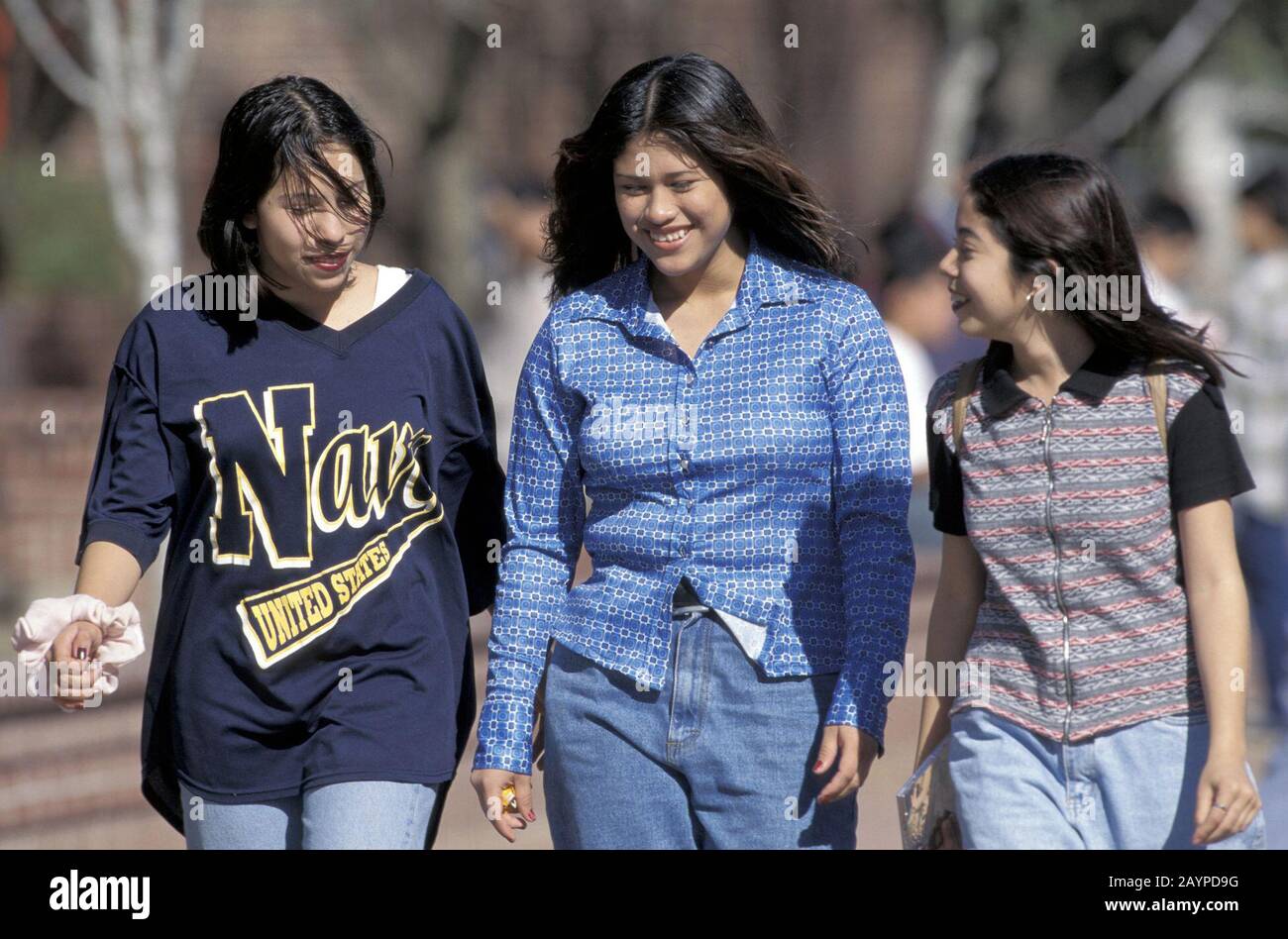 https://c8.alamy.com/comp/2AYPD9G/mercedes-texas-hispanic-junior-high-school-students-walking-outside-school-during-lunch-hour-bob-daemmrich-2AYPD9G.jpg