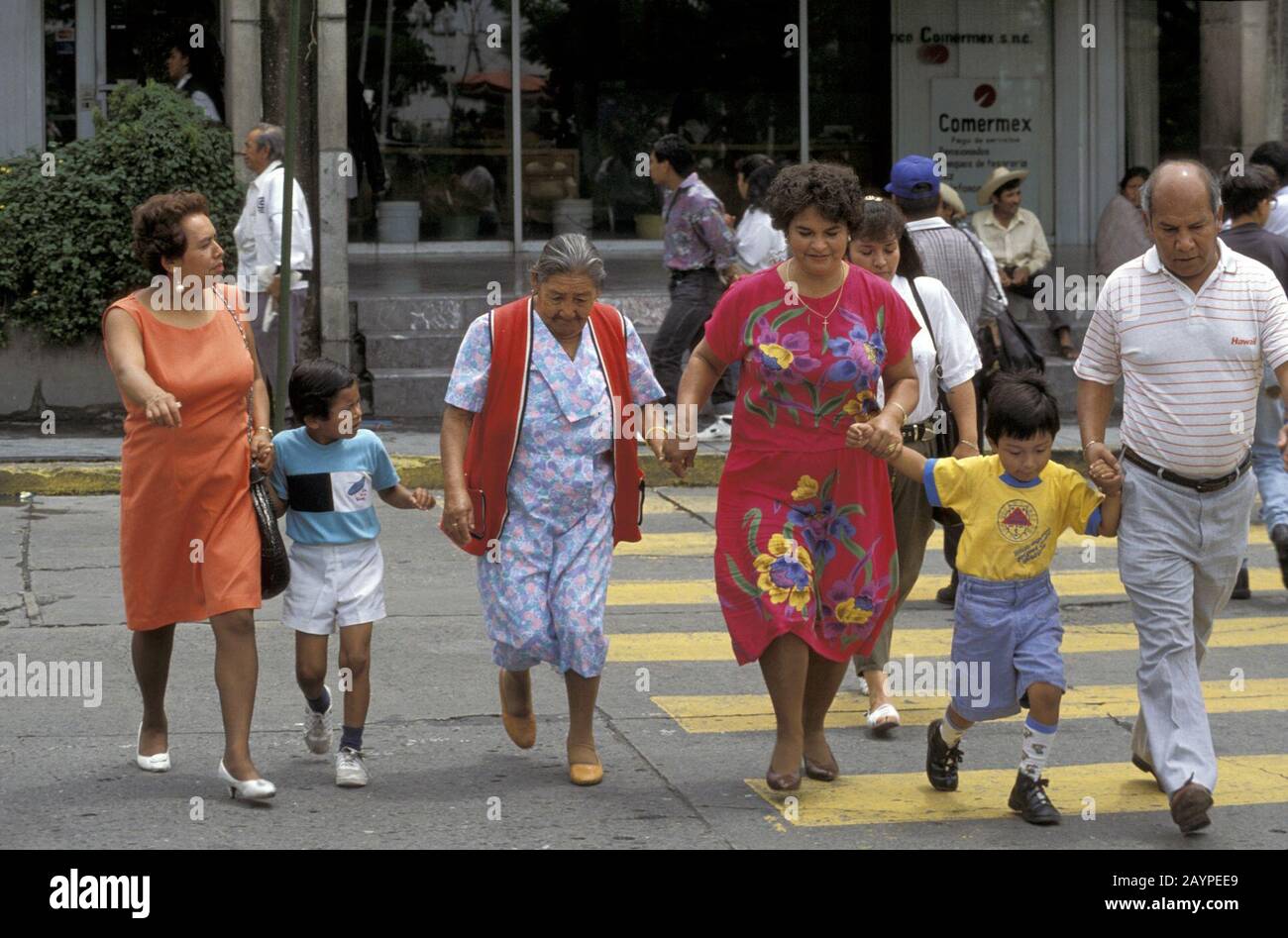 Cuernavaca, Mexico: Pedestrians crossing street. ©Bob Daemmrich Stock Photo