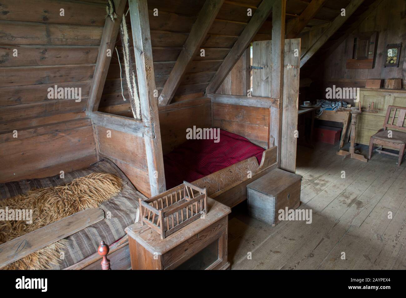 The kids room of a traditional turf house at the Skogar folk museum in southern Iceland. Stock Photo